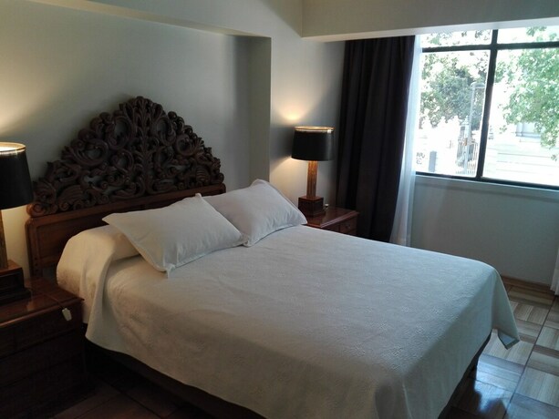 Imagen de la habitación del Hotel Plaza Huelen. Foto 19