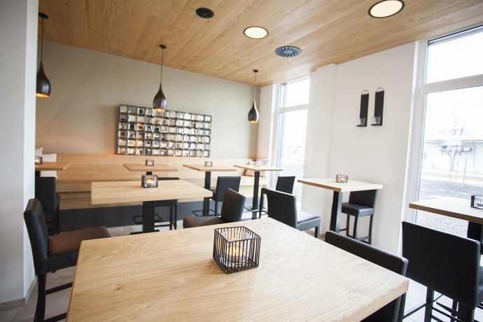 Imagen del bar/restaurante del Hotel Plaza Inn Dachau - München. Foto 10