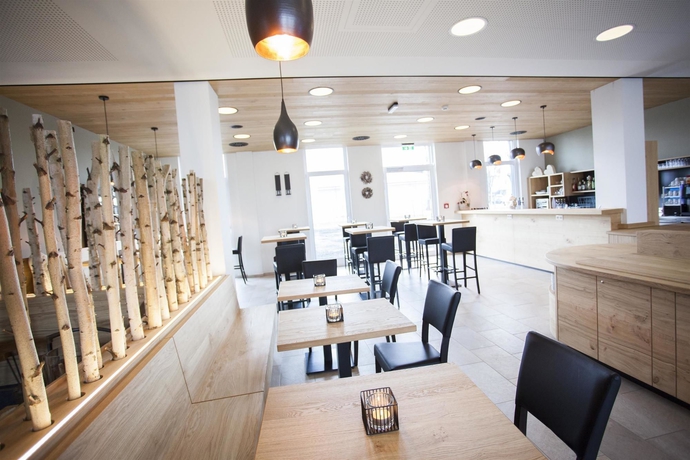 Imagen del bar/restaurante del Hotel Plaza Inn Dachau - München. Foto 14