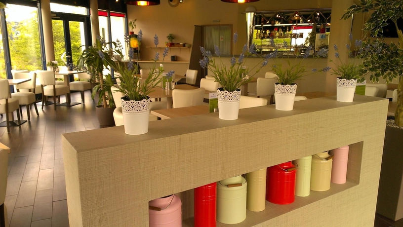 Imagen del bar/restaurante del Hotel Plaza Inn Ludwigsfelde Berlin Süd. Foto 10