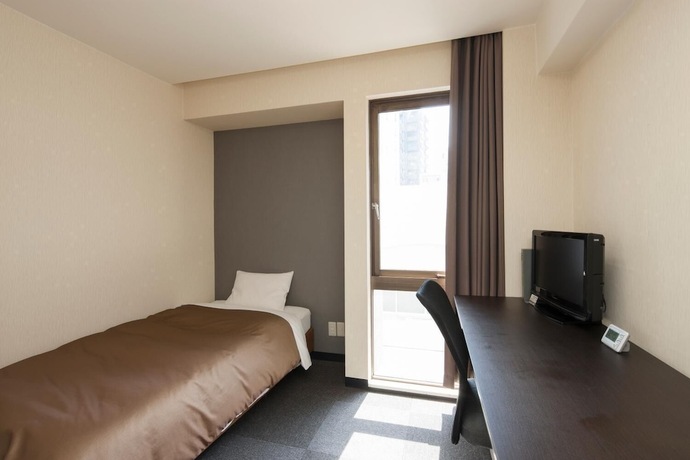 Imagen de la habitación del Hotel Plaza Inn Tokushima. Foto 9