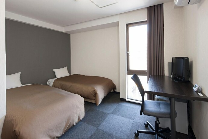 Imagen de la habitación del Hotel Plaza Inn Tokushima. Foto 11