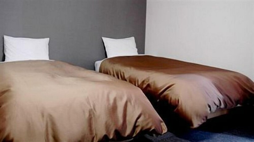 Imagen de la habitación del Hotel Plaza Inn Tokushima. Foto 14