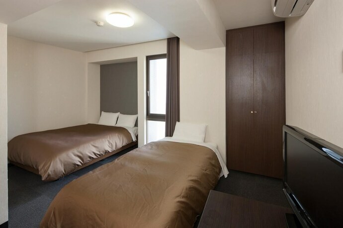Imagen de la habitación del Hotel Plaza Inn Tokushima. Foto 15