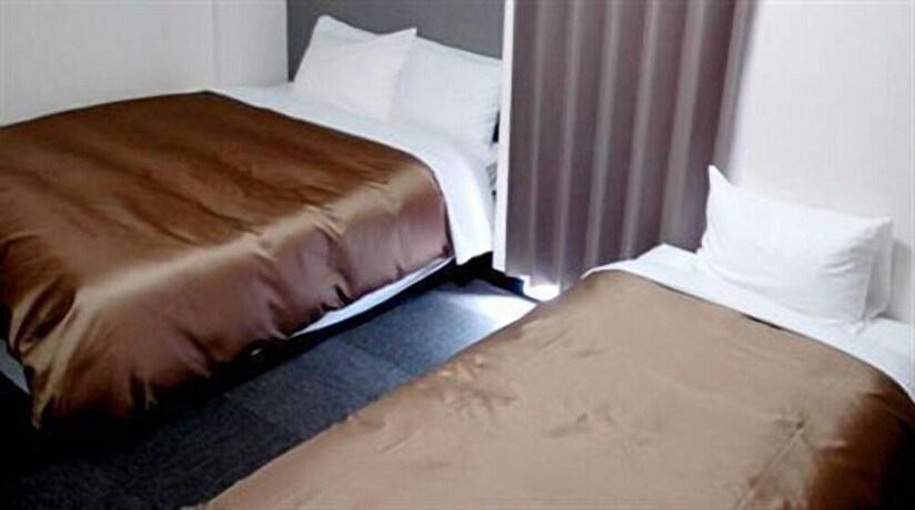 Imagen de la habitación del Hotel Plaza Inn Tokushima. Foto 17