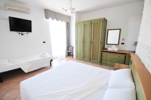 Imagen de la habitación del Hotel Plaza, Lido degli Estensi. Foto 7