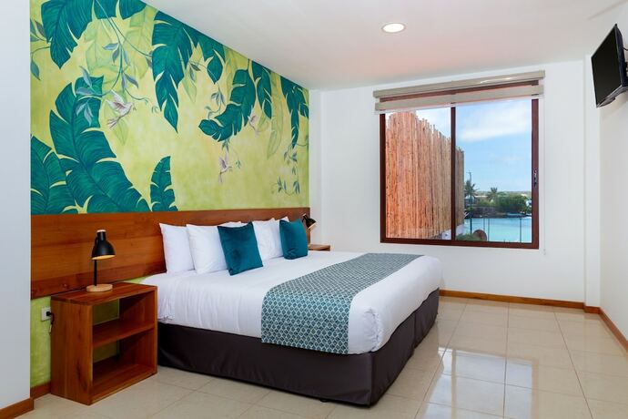 Imagen de la habitación del Hotel Plaza Luna Suites. Foto 11