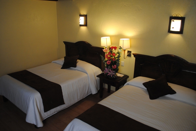 Imagen de la habitación del Hotel Plaza Magnolias. Foto 3