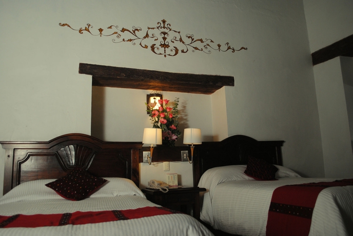 Imagen de la habitación del Hotel Plaza Magnolias. Foto 4