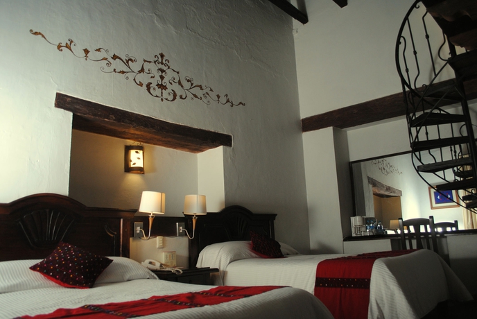 Imagen de la habitación del Hotel Plaza Magnolias. Foto 5