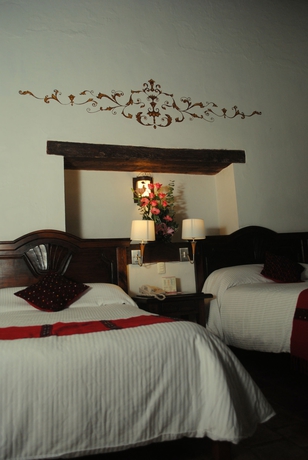 Imagen de la habitación del Hotel Plaza Magnolias. Foto 6