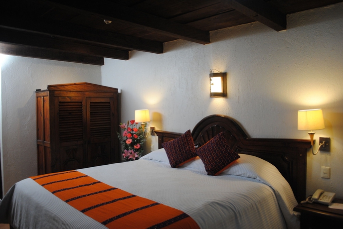 Imagen de la habitación del Hotel Plaza Magnolias. Foto 9