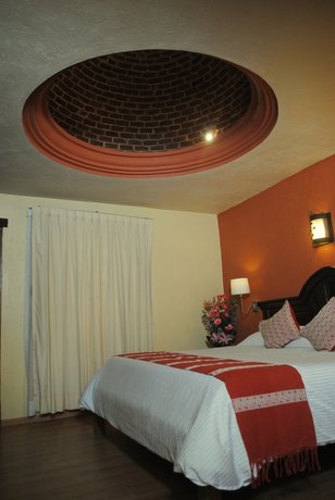 Imagen de la habitación del Hotel Plaza Magnolias. Foto 10