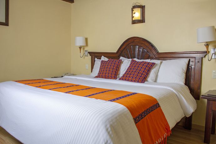 Imagen de la habitación del Hotel Plaza Magnolias Suites. Foto 4