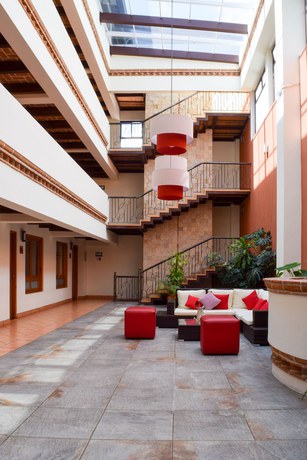 Imagen de la habitación del Hotel Plaza Magnolias Suites. Foto 5