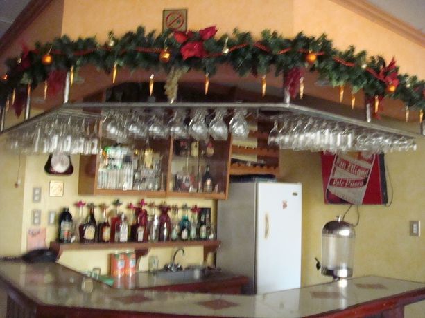 Imagen del bar/restaurante del Hotel Plaza Maria Luisa Suites Inn. Foto 2