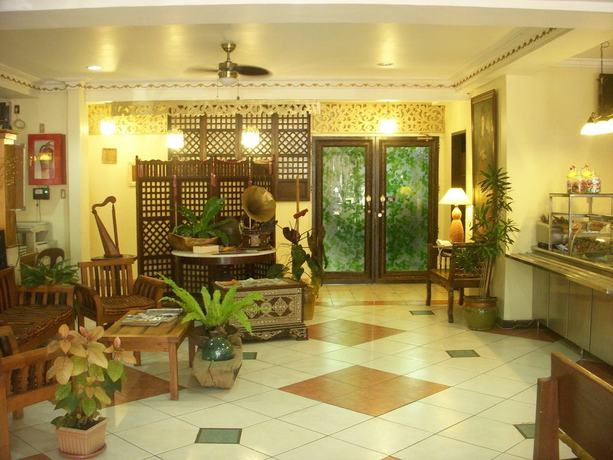 Imagen de los interiores del Hotel Plaza Maria Luisa Suites Inn. Foto 11