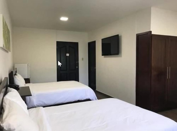 Imagen de la habitación del Hotel Plaza, Nuevo Santiago. Foto 7