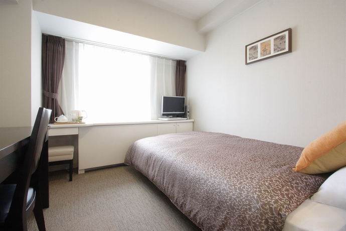 Imagen de la habitación del Hotel Plaza Osaka. Foto 2