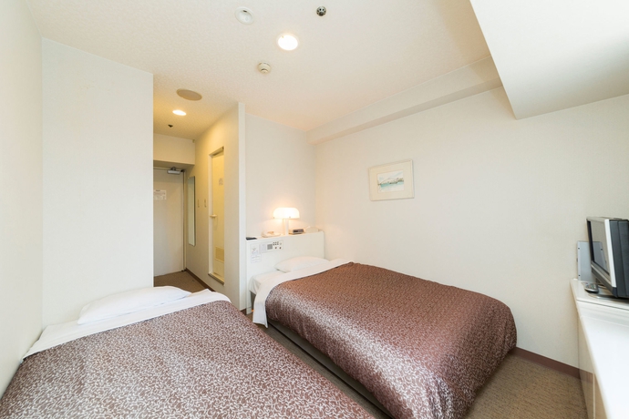 Imagen de la habitación del Hotel Plaza Osaka. Foto 10