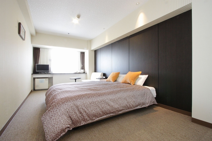 Imagen de la habitación del Hotel Plaza Osaka. Foto 11