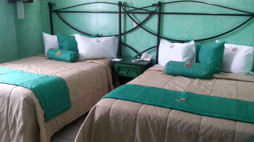 Imagen de la habitación del Hotel Plaza Poblana. Foto 9