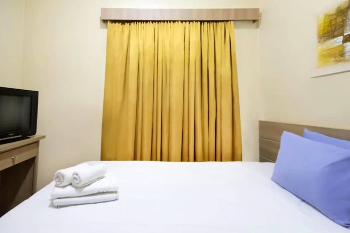 Imagen de la habitación del Hotel Plaza Po&ccedil;os De Caldas. Foto 10