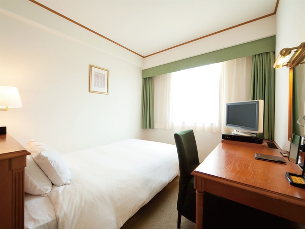 Imagen de la habitación del Hotel Plaza Premier. Foto 10