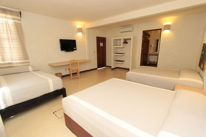 Imagen de la habitación del Hotel Plaza Tangolunda. Foto 2