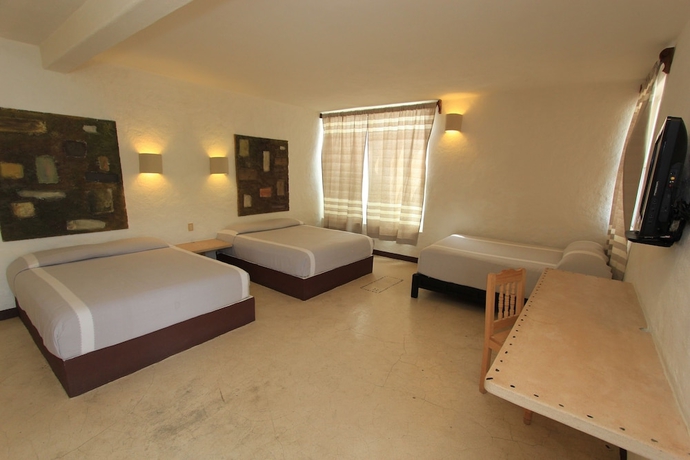 Imagen de la habitación del Hotel Plaza Tangolunda. Foto 3