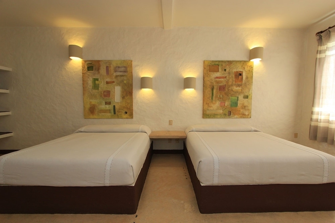 Imagen de la habitación del Hotel Plaza Tangolunda. Foto 4