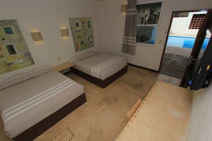 Imagen de la habitación del Hotel Plaza Tangolunda. Foto 5