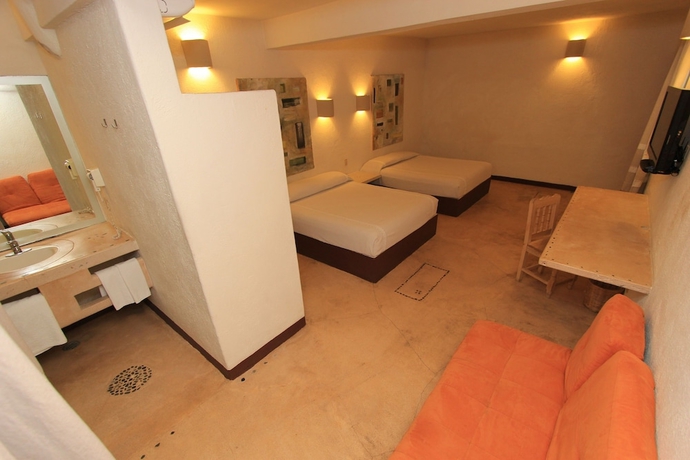 Imagen de la habitación del Hotel Plaza Tangolunda. Foto 6