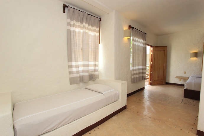 Imagen de la habitación del Hotel Plaza Tangolunda. Foto 9