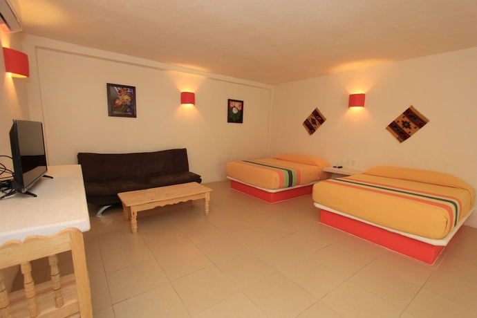 Imagen de la habitación del Hotel Plaza Tangolunda. Foto 10