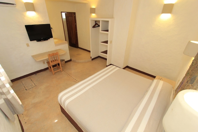 Imagen de la habitación del Hotel Plaza Tangolunda. Foto 13