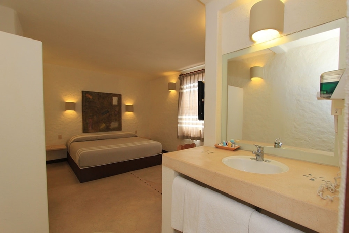 Imagen de la habitación del Hotel Plaza Tangolunda. Foto 15
