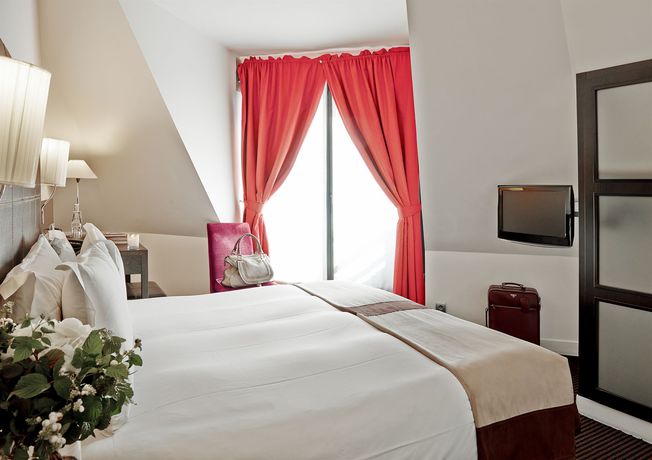 Imagen de la habitación del Hotel Plaza Tour Eiffel. Foto 8