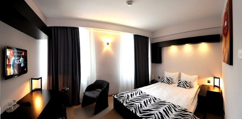 Imagen de la habitación del Hotel Plaza V. Foto 16