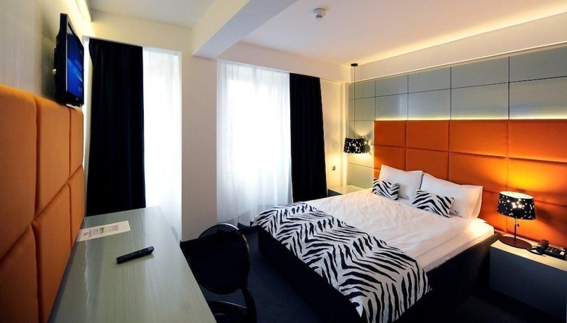 Imagen de la habitación del Hotel Plaza V. Foto 18