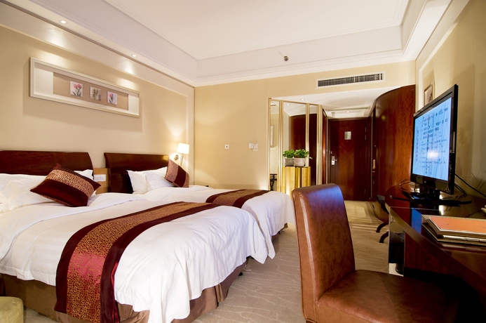 Imagen de la habitación del Hotel Plaza Yuyao. Foto 9