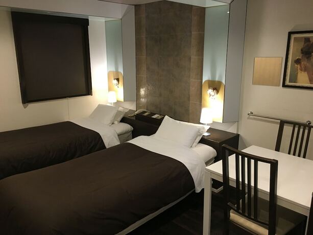 Imagen de la habitación del Hotel Plaza21 Osaka. Foto 21