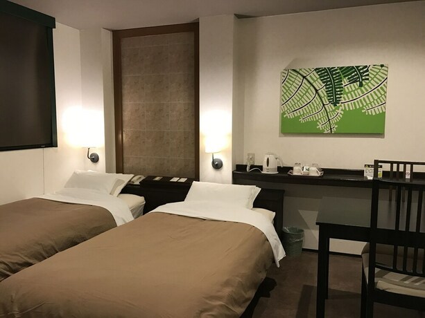 Imagen de la habitación del Hotel Plaza21 Osaka. Foto 22
