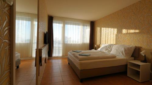 Imagen de la habitación del Hotel Plazs Si&oacute;fok. Foto 15