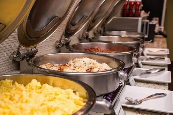 Imagen del bar/restaurante del Hotel Plazza , Trichy. Foto 3