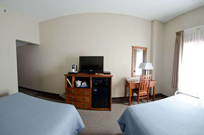 Imagen de la habitación del Hotel Pleasant Night Inn. Foto 18