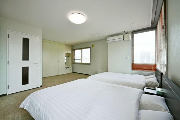 Imagen de la habitación del Hotel Pleasure Maruyama. Foto 17