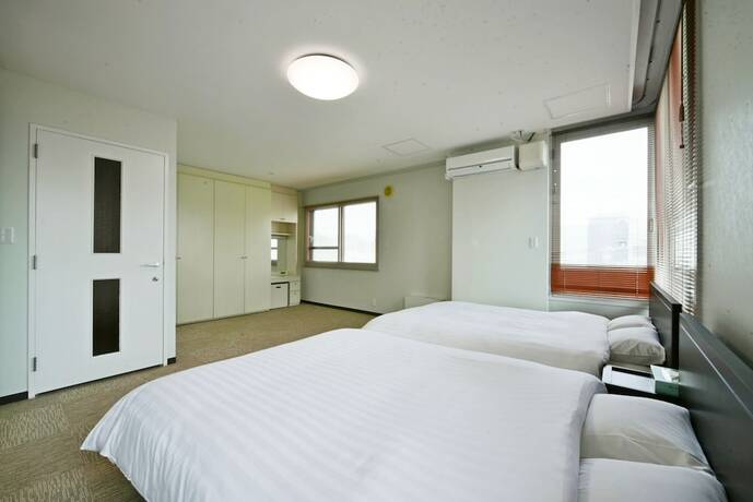 Imagen de la habitación del Hotel Pleasure Maruyama. Foto 22