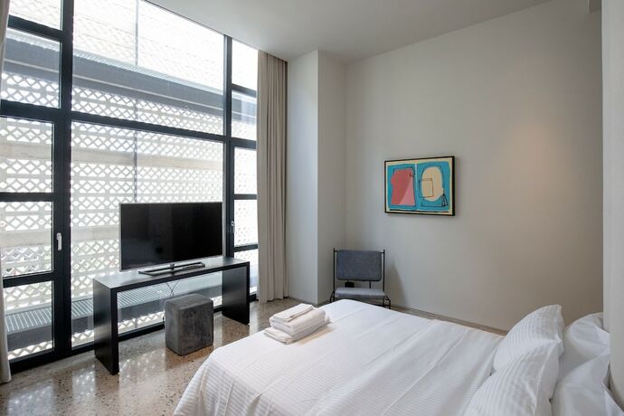 Imagen de la habitación del Hotel PlexiSpace. Foto 11