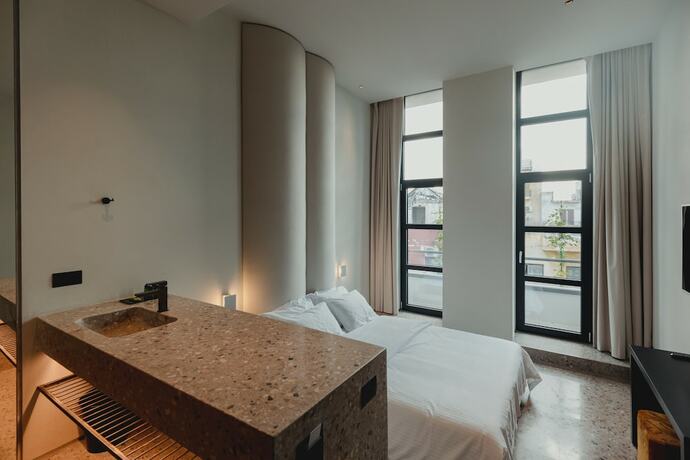 Imagen de la habitación del Hotel PlexiSpace. Foto 12